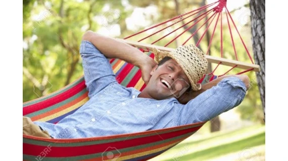 18723075-man-relaxing-in-hammock-stock-photo-rest-jpg