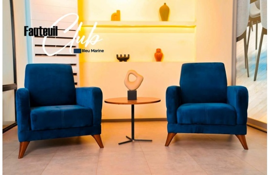 Découvrez le fauteuil club bleu 1+1, un élément incontournable pour un espace de détente élégant et confortable, désormais disponible à l'achat sur PromosN. Avec son design intemporel et sa couleur bleu profond, ce fauteuil club apporte une touche de raffinement et de style à n'importe quelle pièce de votre maison.

Le fauteuil club est une icône du design intérieur, alliant charme rétro et confort moderne. Avec son revêtement en tissu bleu, ce fauteuil offre un look classique et élégant qui s'intègre parfaitement à tous les types de décor, qu'il soit traditionnel ou contemporain.

Doté d'une assise spacieuse et d'un dossier enveloppant, ce fauteuil club offre un confort exceptionnel pour se détendre après une longue journée. Que ce soit pour lire un livre, regarder la télévision ou simplement se reposer, ce fauteuil vous invite à vous relaxer dans une ambiance chaleureuse et accueillante.

Fabriqué avec des matériaux de haute qualité et une construction robuste, ce fauteuil club est conçu pour durer. Son cadre solide garantit une stabilité optimale, tandis que son revêtement en tissu résistant est facile à entretenir, pour une durabilité à long terme.

Que vous l'installiez dans votre salon, votre bureau ou votre chambre à coucher, ce fauteuil club bleu 1+1 ajoute une touche de style et de confort à votre espace. Ne manquez pas cette occasion d'ajouter une pièce maîtresse à votre décoration intérieure avec ce fauteuil club, disponible dès maintenant sur PromosN. Redéfinissez votre style et créez un espace de détente luxueux que vous apprécierez pendant des années à venir.

